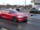 tesla model s faces off against a audi tt rs and the ice vs ev battle almost takes a surprising turn